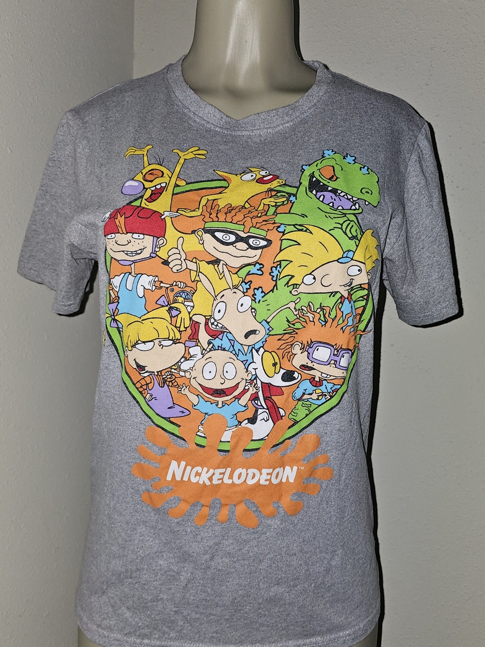 Nickelodeon Grey Tee with Bright Multi-Character Graphic and Orange Logo